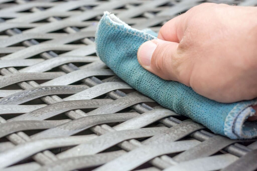 Cleaning outdoor furniture to prepare for winter outdoor furniture storage