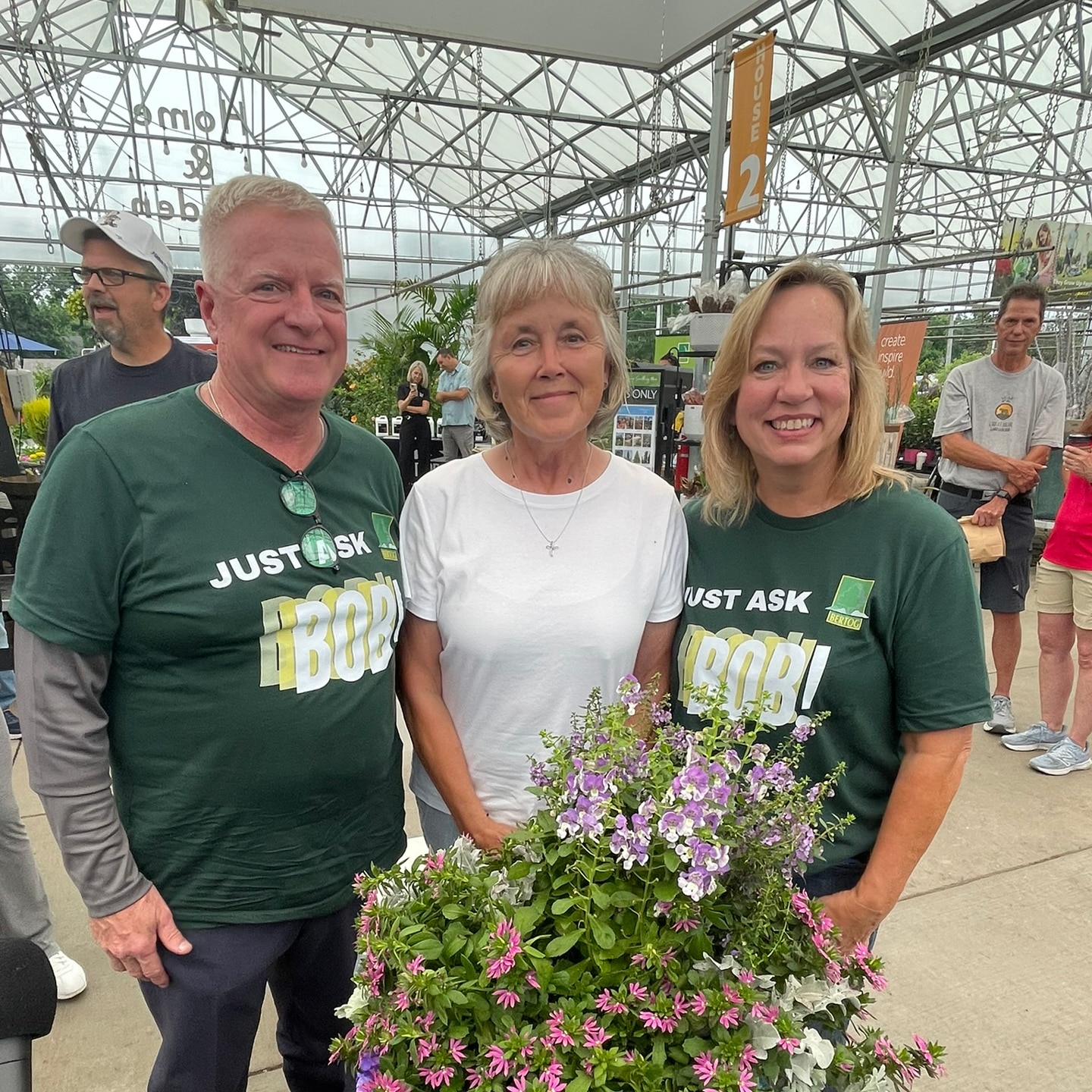 Sue and Bo from Bertog Landscape with the container raffle winner