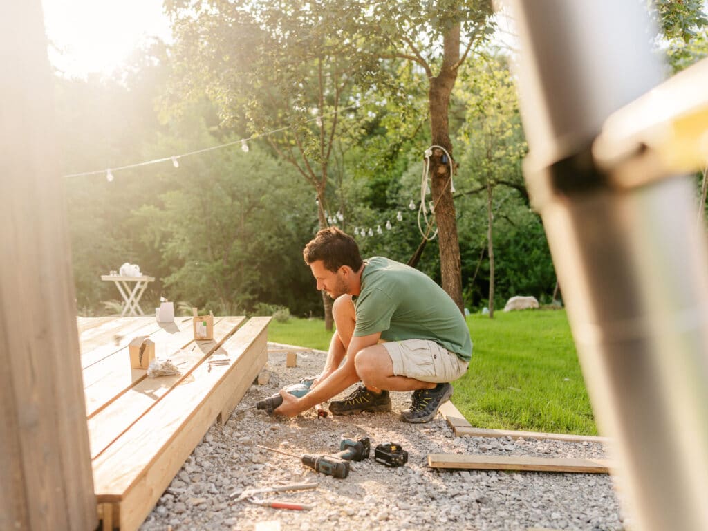 Homeowner working on a backyard project