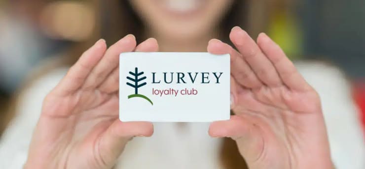 Lurvey Loyalty Club card being held in hands lets you save with current offers